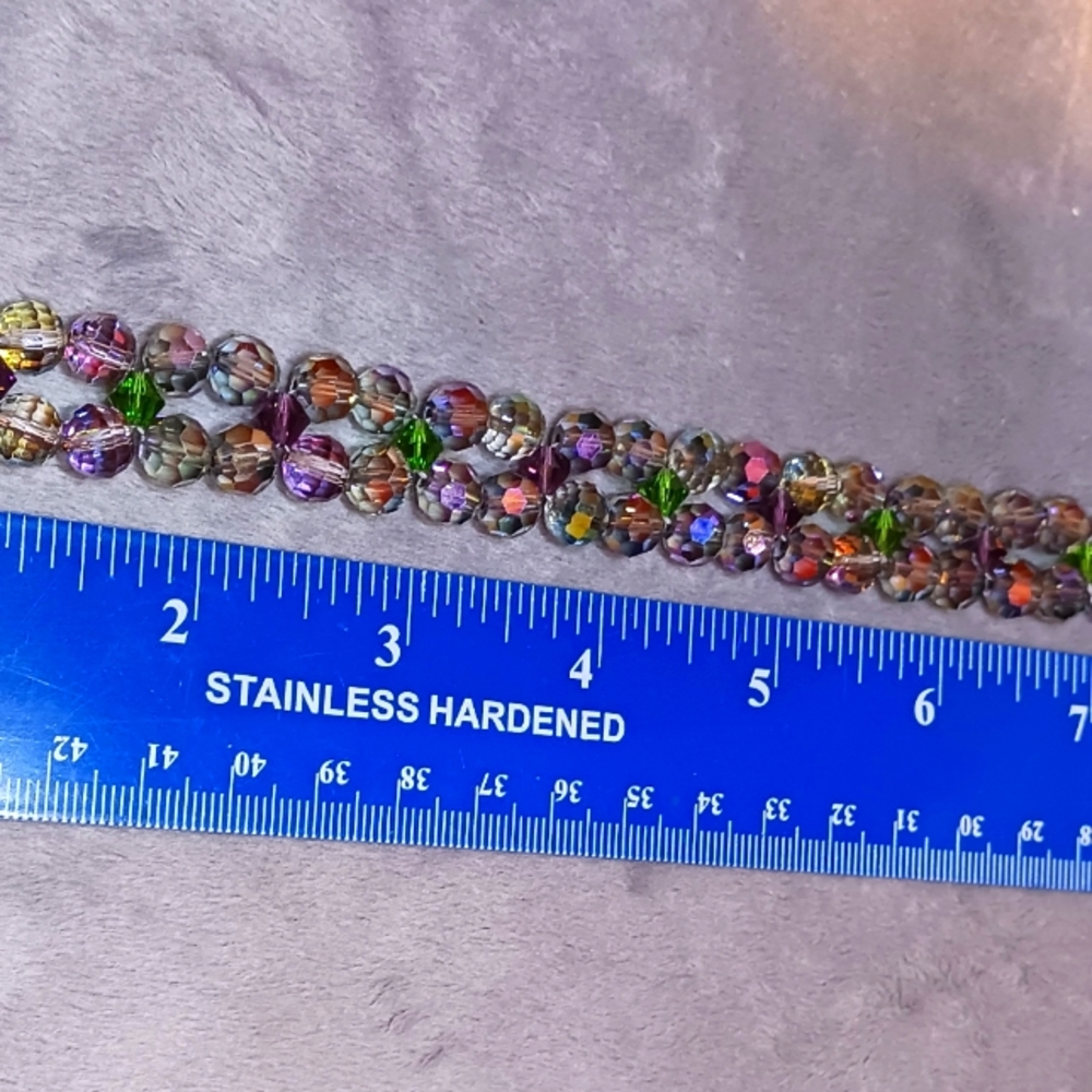 Crystal Bracelet with .925 Sterling Lobster clasp. Green, purple, smoky crystals